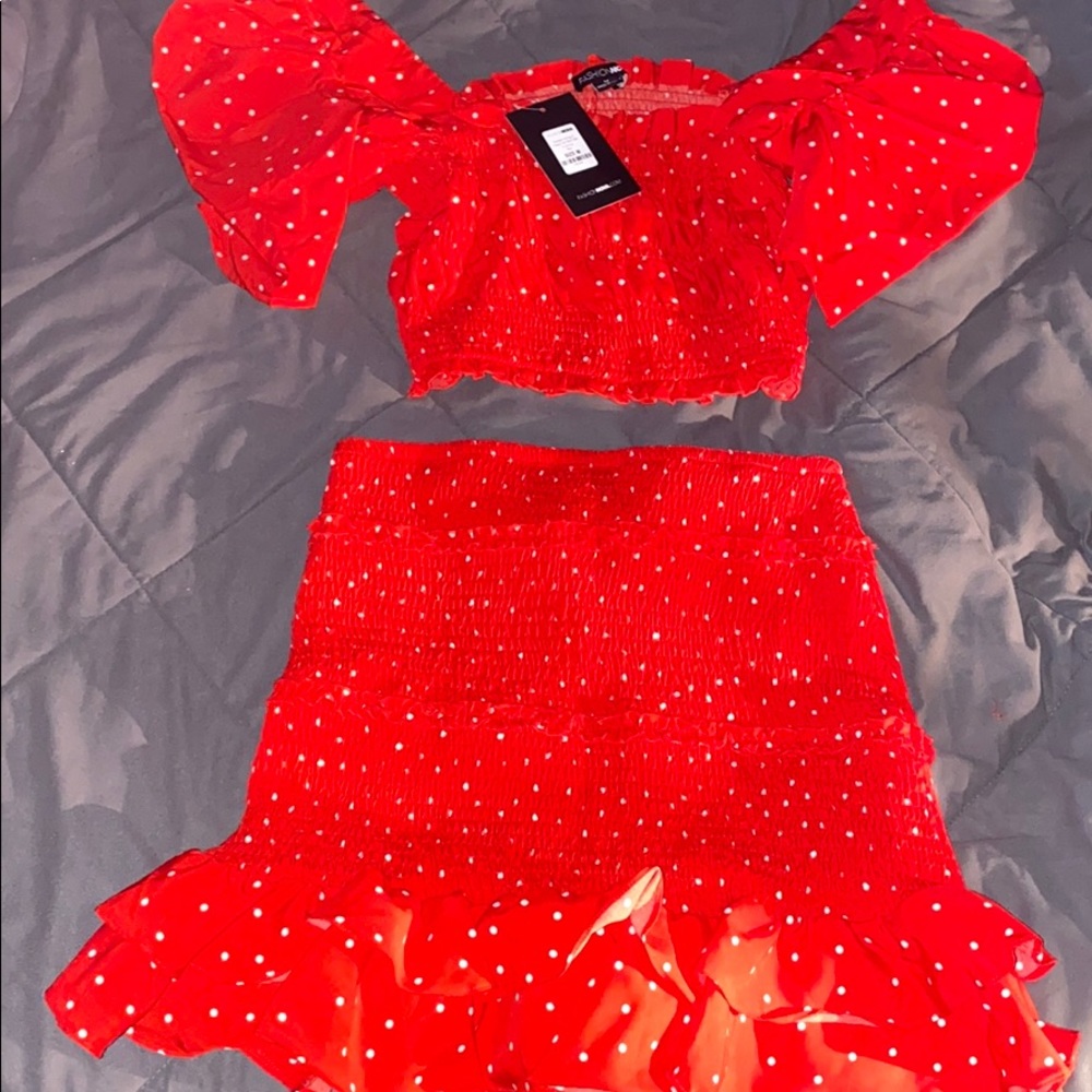 Fashion nova two piece red polka dot outfit.